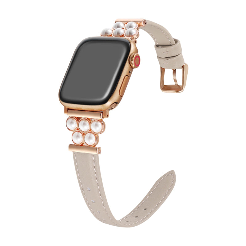 Bracelet pour Apple Watch en simili vegan taupe avec rangée de perles blanches décoratives.
