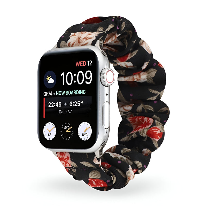 Bracelet Apple Watch en tissu élastique noir à motif floral rouge et beige, style Leyra, pour femme.