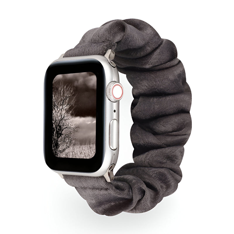 Bracelet élastique gris foncé pour Apple Watch avec texture froissée, modèle Nyssara.