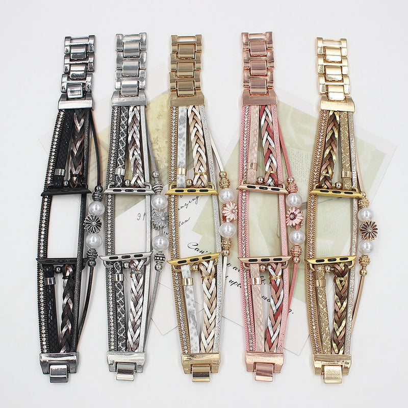 Bracelets multi-rangs pour Apple Watch avec charms fleur, disponibles en noir, argent, or rose, or, mélange or et argent.