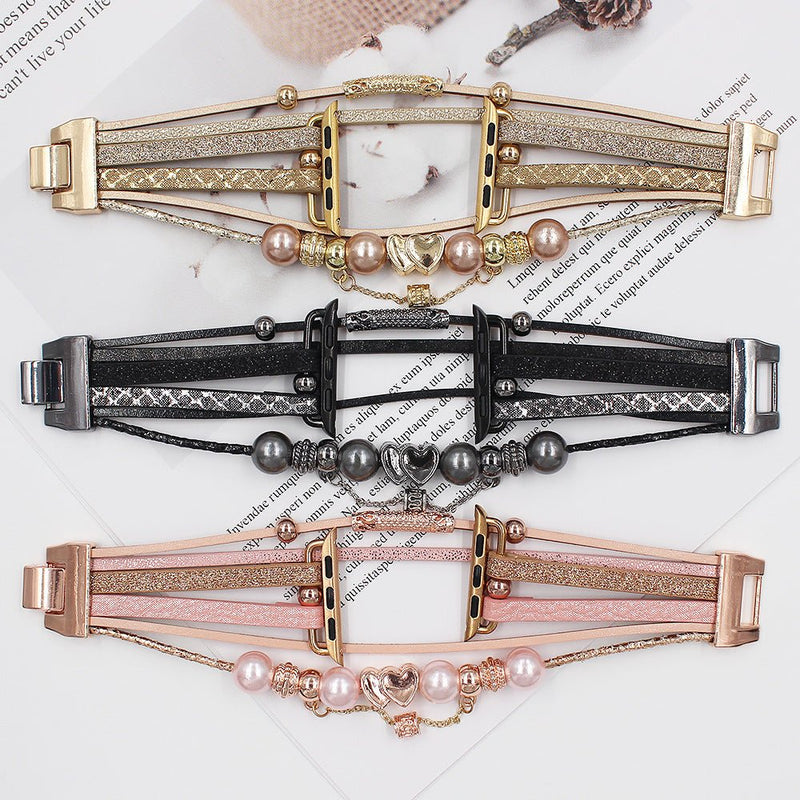 Bracelet Apple Watch multi-rangs avec charms perles doré, noir et rose, pour femme.