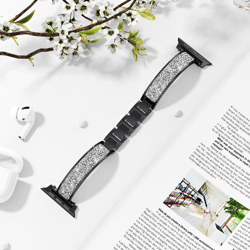 Bracelet Apple Watch noir pailleté pour femme avec boucle métallique noire.
