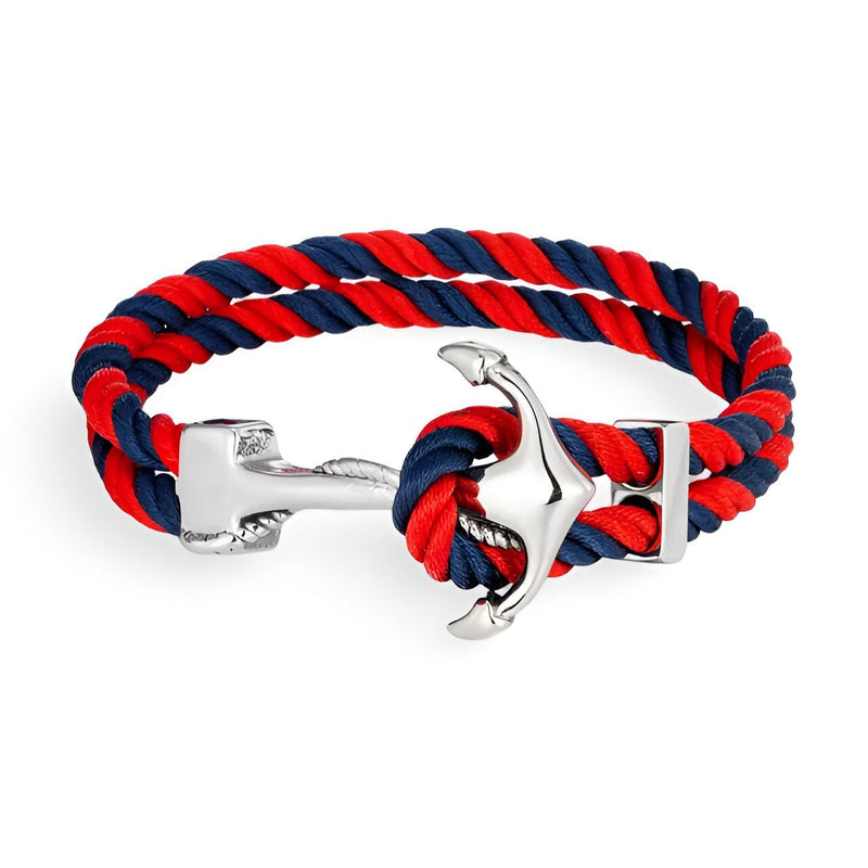 Bracelet double cordon rouge et bleu avec ancre métallique argentée style marin.