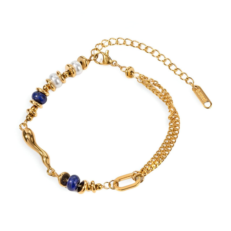 Bracelet double en acier inoxydable doré avec perles lapis lazuli bleues et détails ronds dorés.