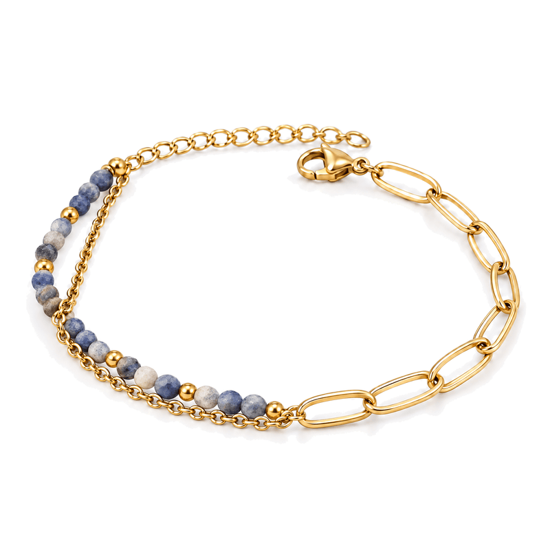 Packshot studio bracelet Kista Pierre de l'empereur, vue frontale basse posée sur table, fond blanc pur — 9 octobre 2026