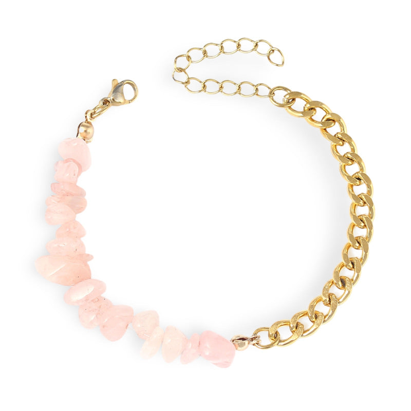 Bracelet doré avec chaîne et pierres naturelles rose quartz aux formes irrégulières.