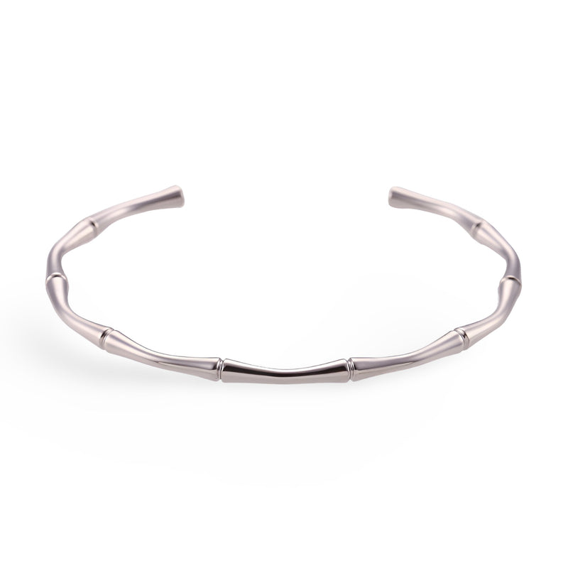 Bracelet en acier inoxydable argenté design bambou ouvert style minimaliste féminin.