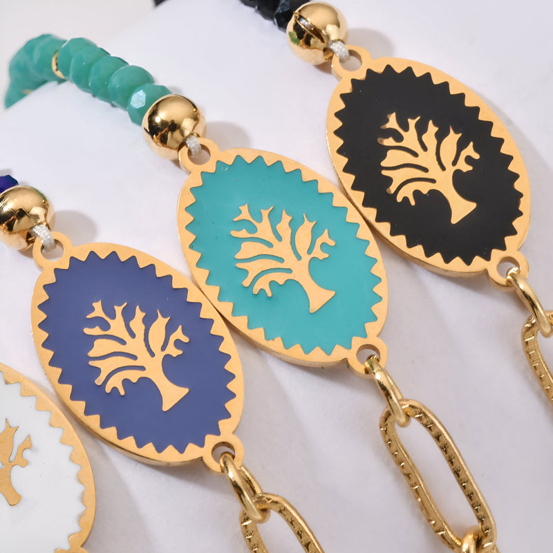 Bracelet acier inoxydable femme avec pendentif arbre de vie coloré or et perles turquoise, bleu et blanc.