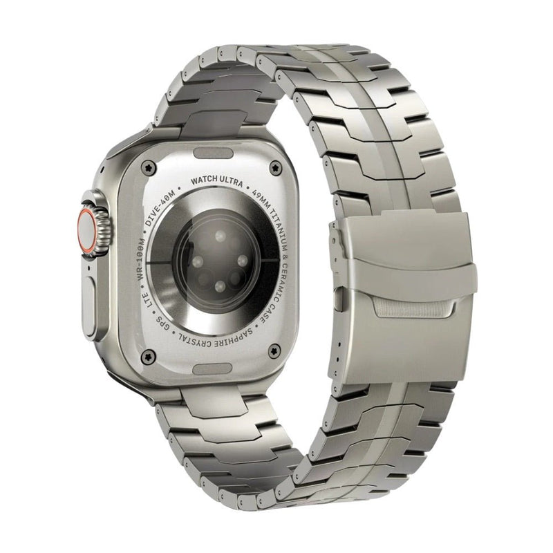 Bracelet en acier inoxydable argenté, maillons larges, pour Apple Watch, finition mate et boucle déployante robuste.