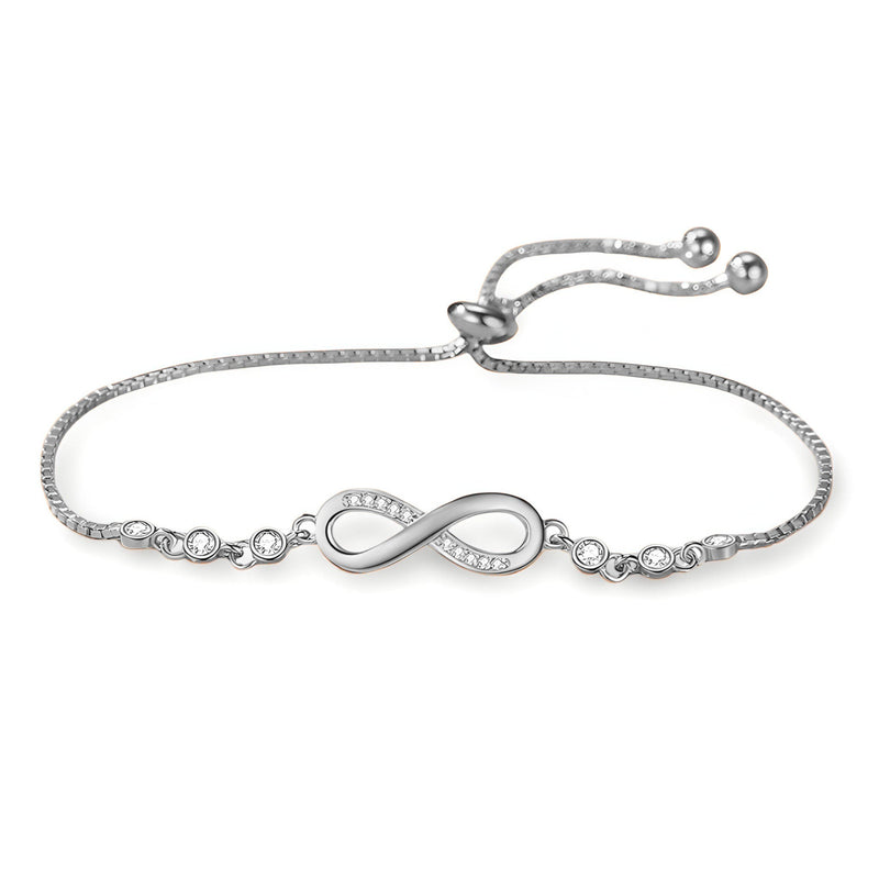 Bracelet en argent sterling avec charm infini et chaîne fine ajustable, finition brillante.