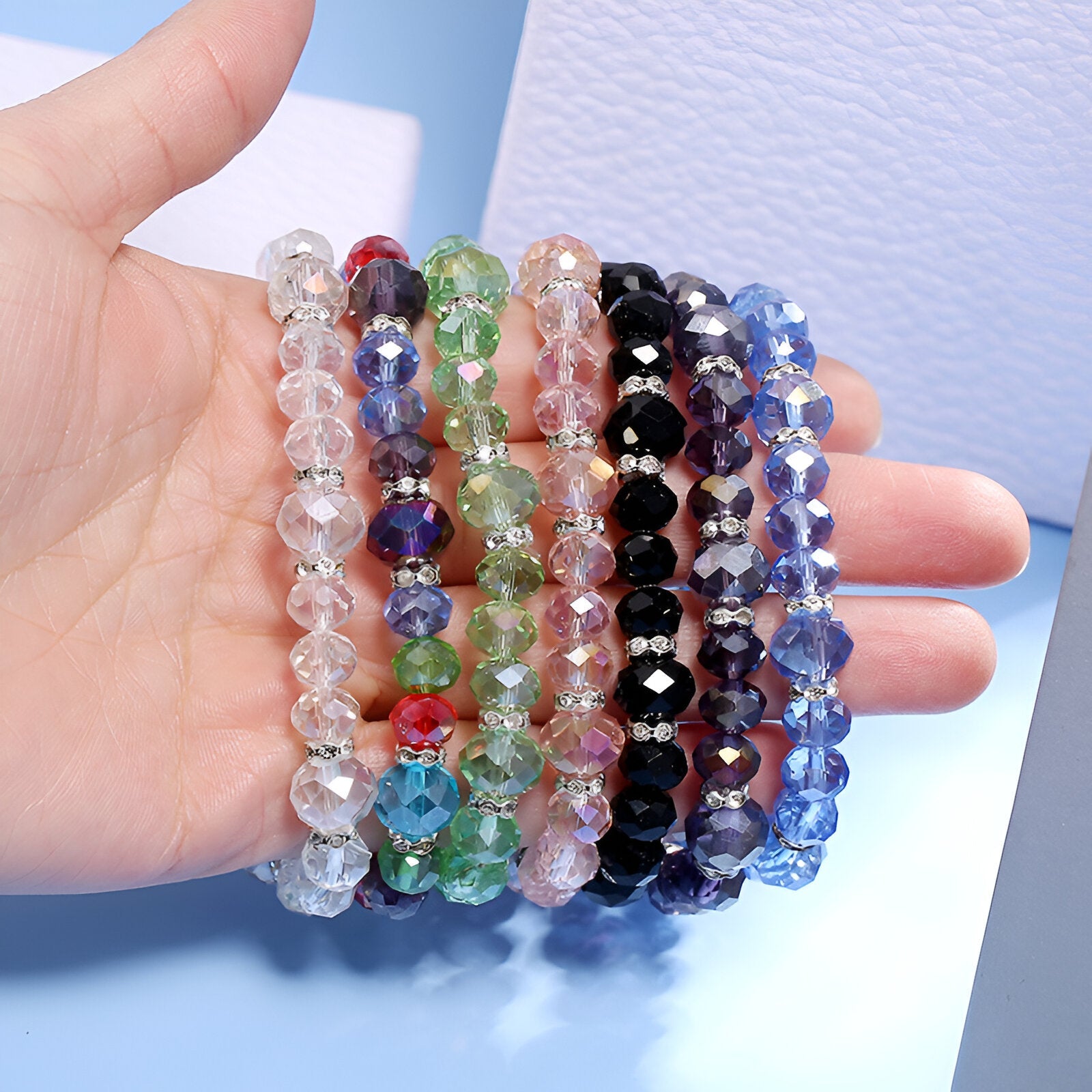 Bracelets en cristal aux couleurs vives bleu, rose, multicolore, noir, violet et vert, perles facettées élégantes.