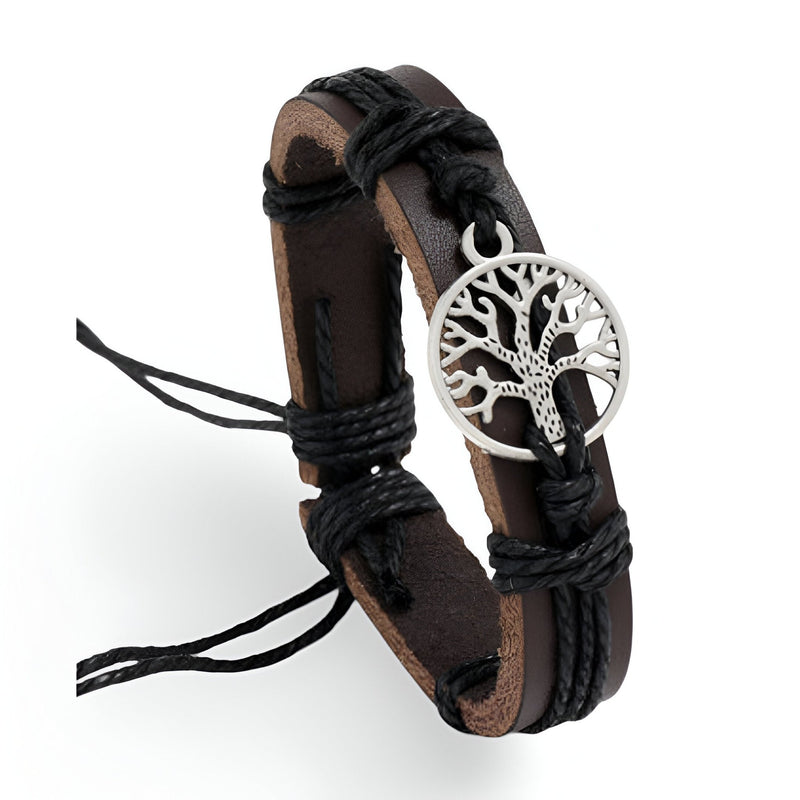 Bracelet en cuir marron avec cordons noirs et pendentif arbre de vie en métal argenté.