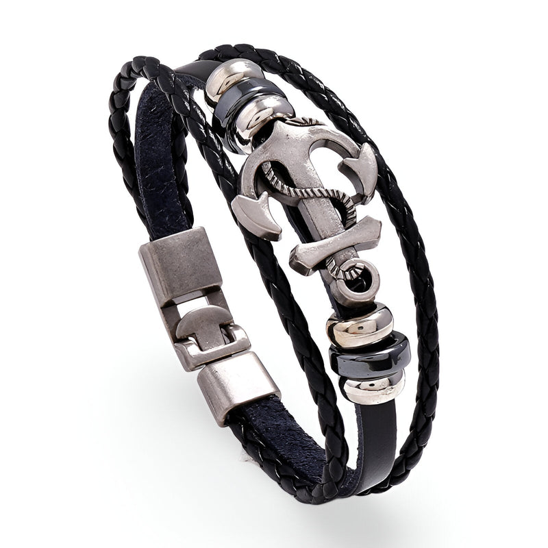Bracelet en cuir noir multi-rangs avec ancre marine en métal argenté et détails argentés.