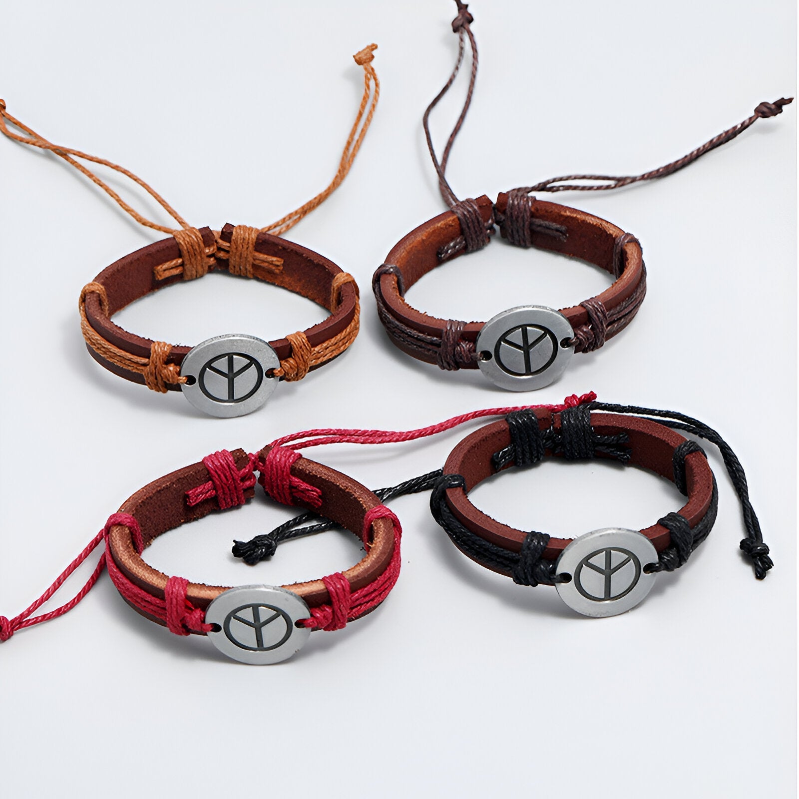 Bracelets en cuir Nita, mixte, avec médaillon peace and love, couleurs noir, rouge, marron et café, fermeture à nœud.
