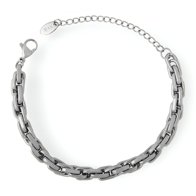 Bracelet en maille épaisse en titane argenté avec fermoir à mousqueton et chaîne ajustable.