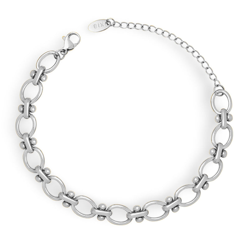 Bracelet en maille marine en titane plaqué argent avec fermoir mousqueton et chaînette ajustable.