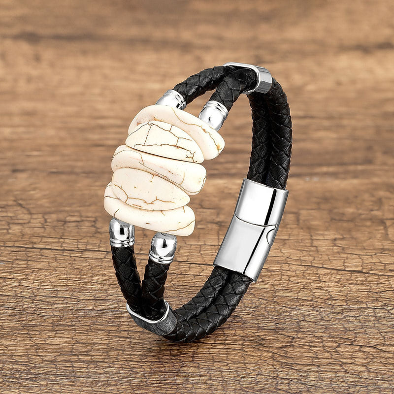 Bracelet homme en microfibre noire tressée avec ornements en turquoise blanche et fermoir argenté brillant.