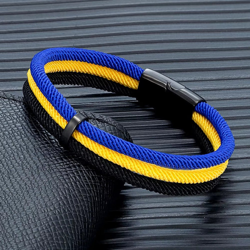 Bracelet en nylon tressé bleu et jaune avec fermoir noir magnétique, modèle Stren.
