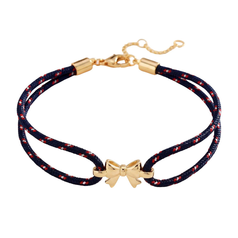 Pulsera de nailon trenzado con charm de lazo dorado, accesorio femenino ajustable y refinado, ideal para un look chic y espontáneo, modelo Rubane