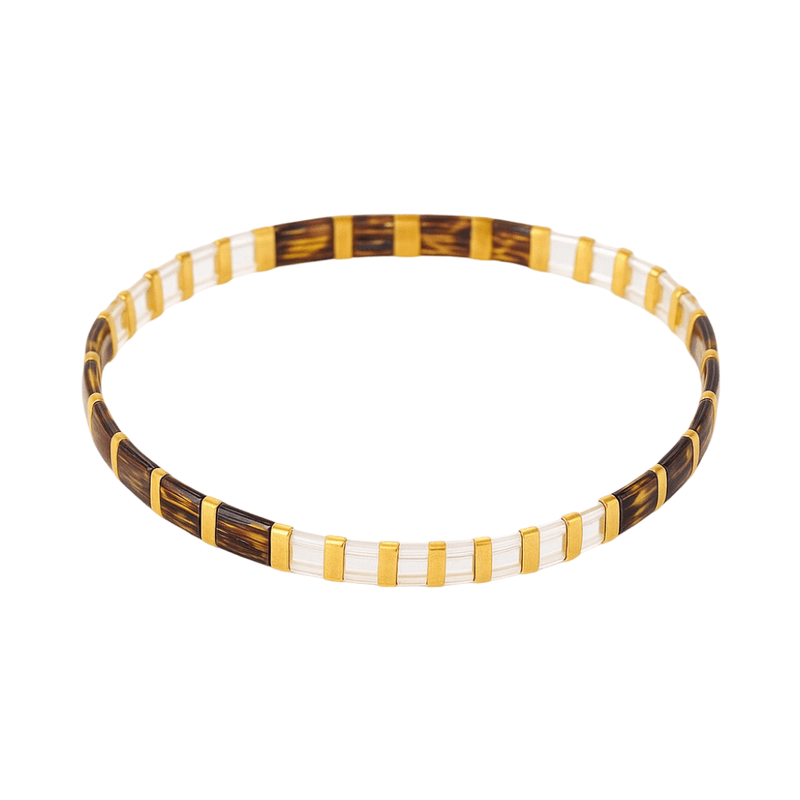 Bracelet fin marron et blanc en perles japonaises, style tressé élégant pour femme.