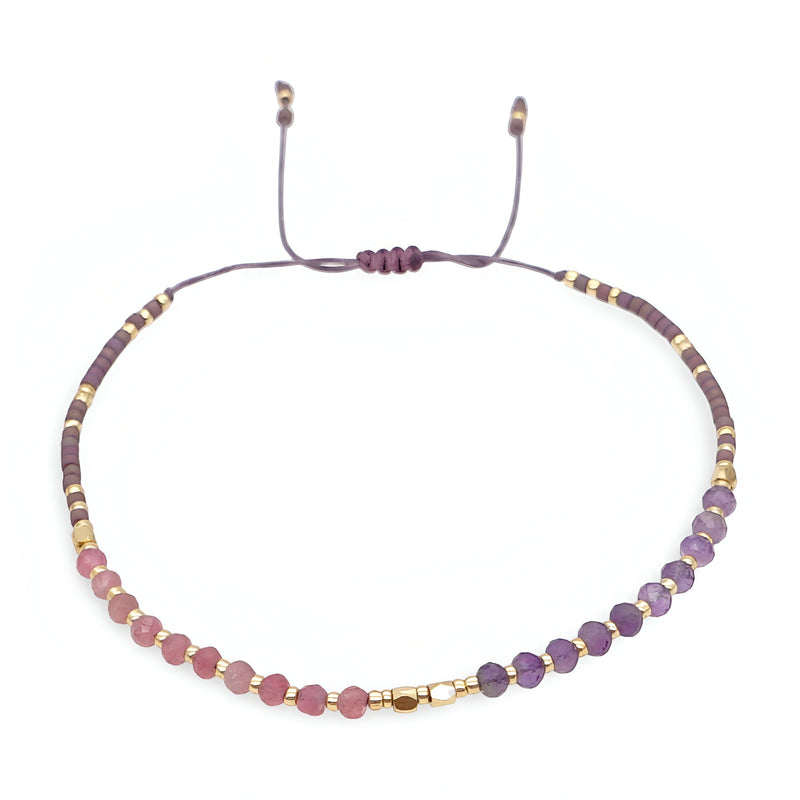 Bracelet femme perles heishi violet dégradé avec cristaux dorés et cordon réglable noir.