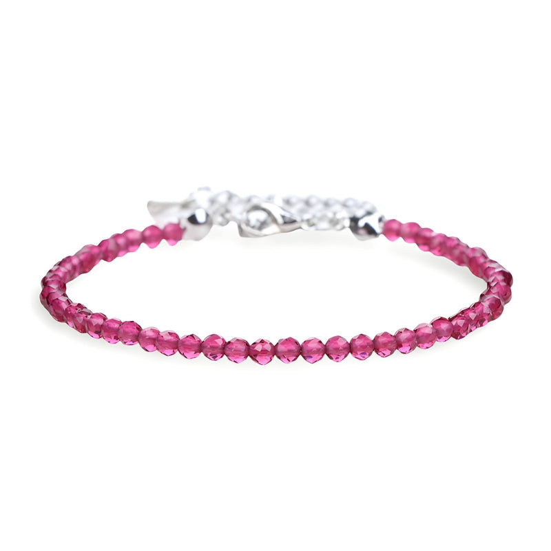 Bracelet fin en perles rondes rouge foncé avec fermoir argenté et chaîne d'extension.