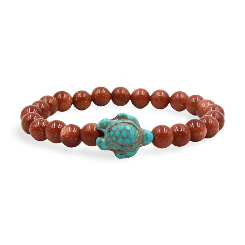 Bracelet mixte en perles marron avec tortue turquoise centrale en pierre naturelle.