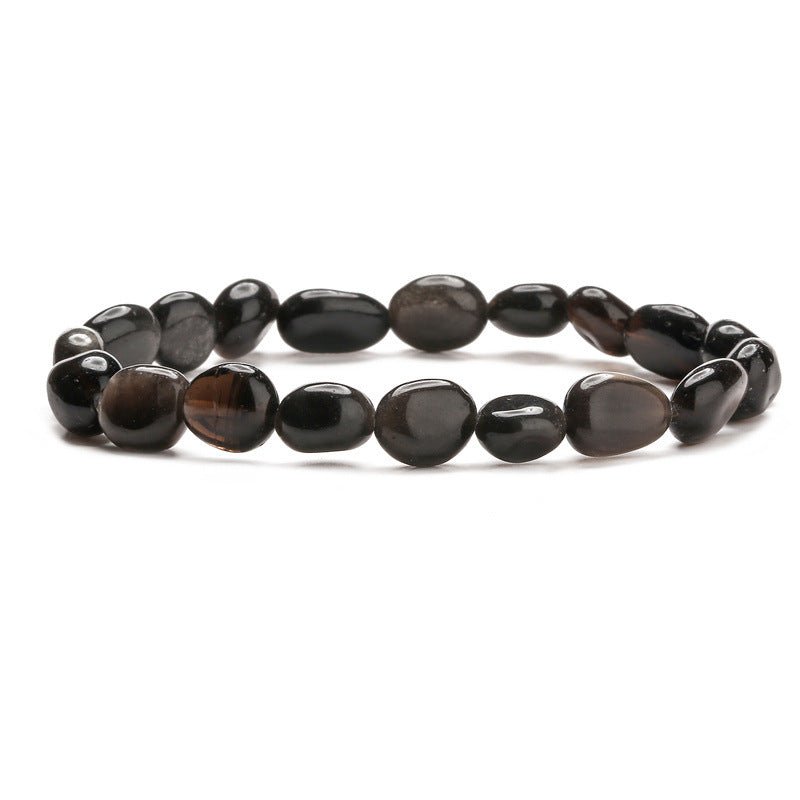Bracelet asymétrique en pierres naturelles noires lisses, modèle Evolet, design unique et élégant.