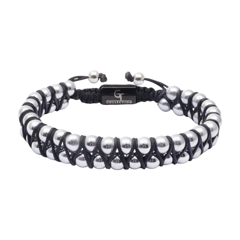 Bracelet double rang en pierres naturelles noires et gris argent, encordé style Tamal avec fermoir ajustable.