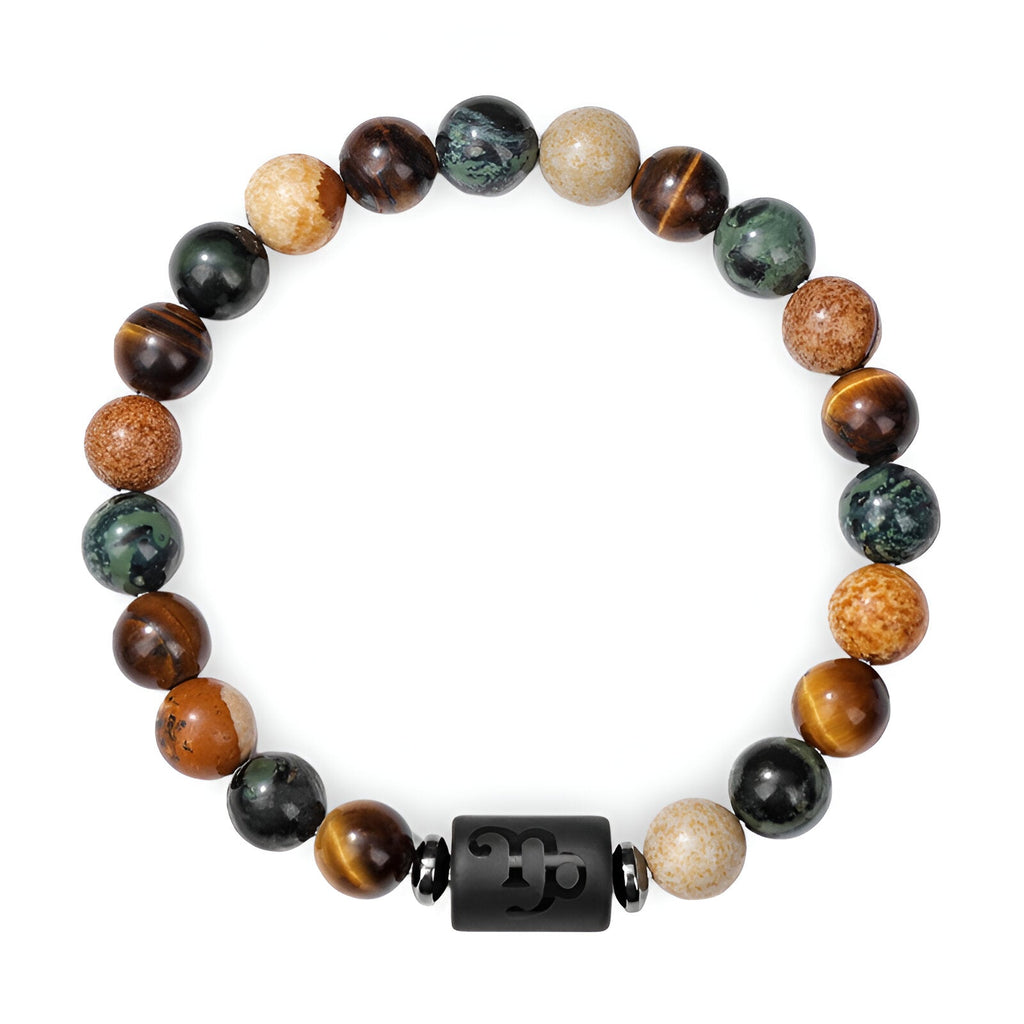 Bracelet mixte en pierres naturelles multicolores avec perle centrale noire gravée d'un symbole zodiaque.