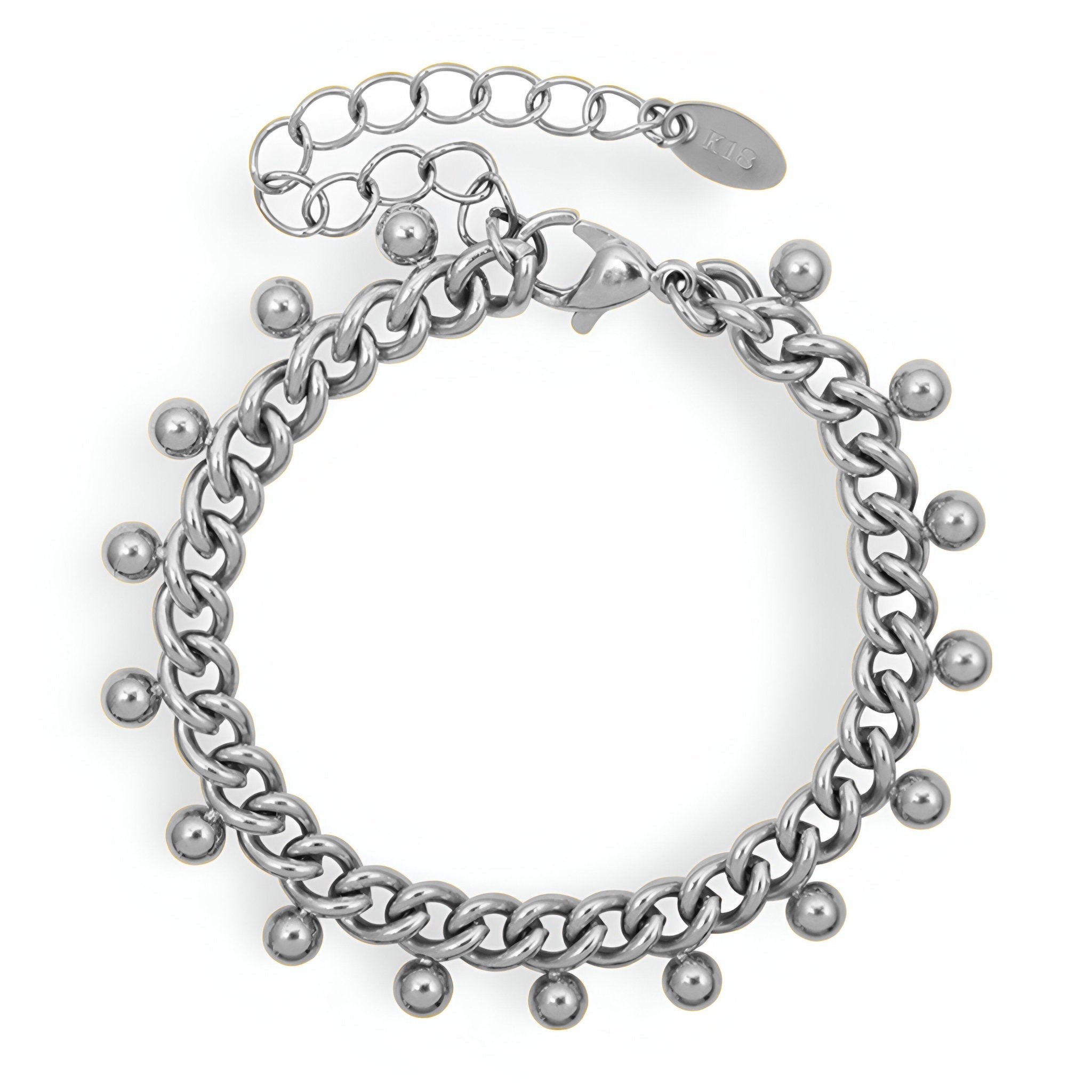 Bracelet en titane argenté chaîne épaisse avec petites perles rondes suspendues.