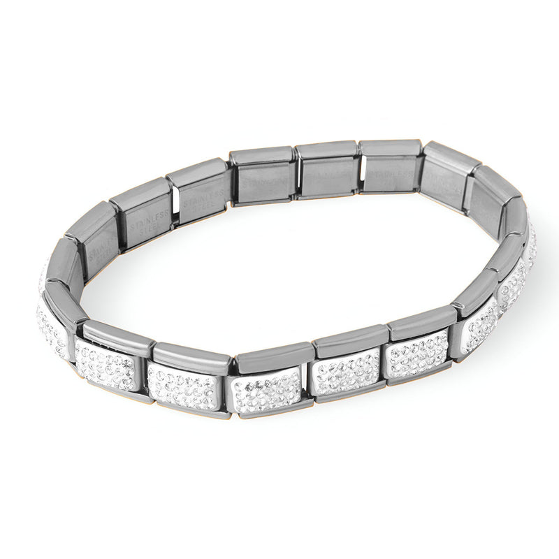 Bracelet rigide en titane argenté à maillons rectangulaires sertis de zircones blanches éclatantes.