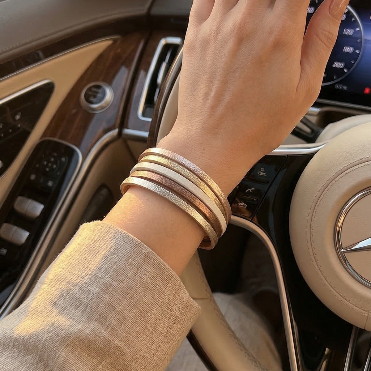 Women's multi-strap leather bracelet, gold and brown designer cuff bracelet, elegant accessory with magnetic clasp, Elyra model