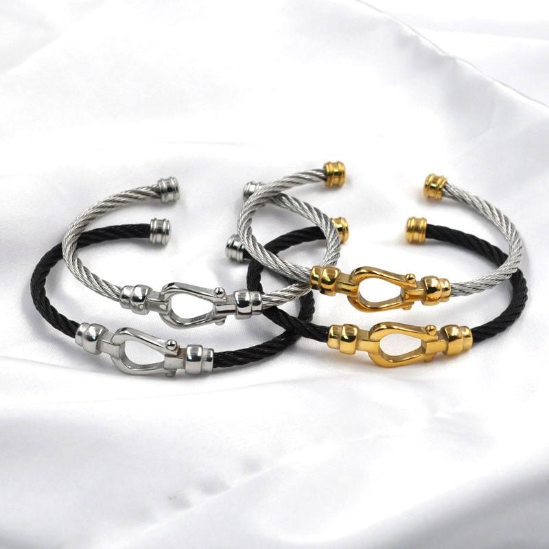 Bracelets joncs ouverts en acier inoxydable, câble torsadé argenté et noir, fermoirs mousqueton dorés et argentés.