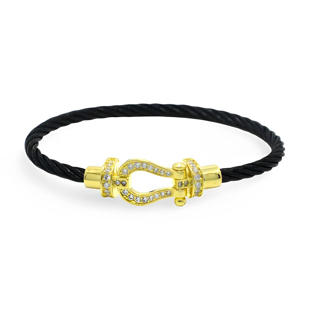 Bracelet femme cordon noir titane fermoir fer à cheval or doré et strass blancs.