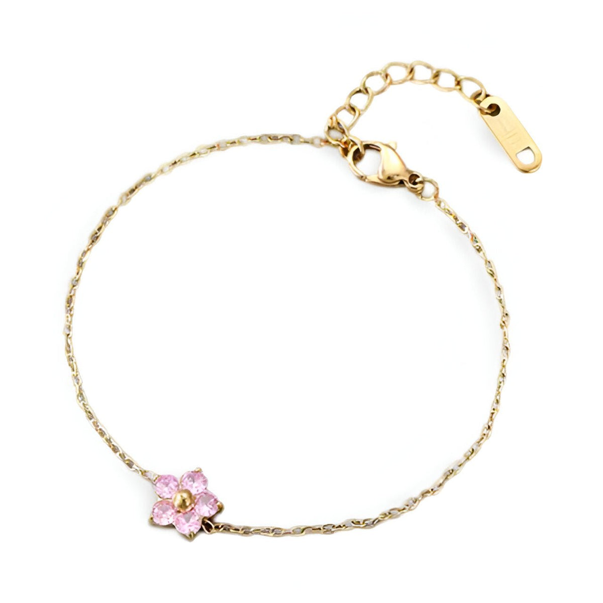 Bracelet fin en acier inoxydable avec fleur rose délicate et détails dorés.