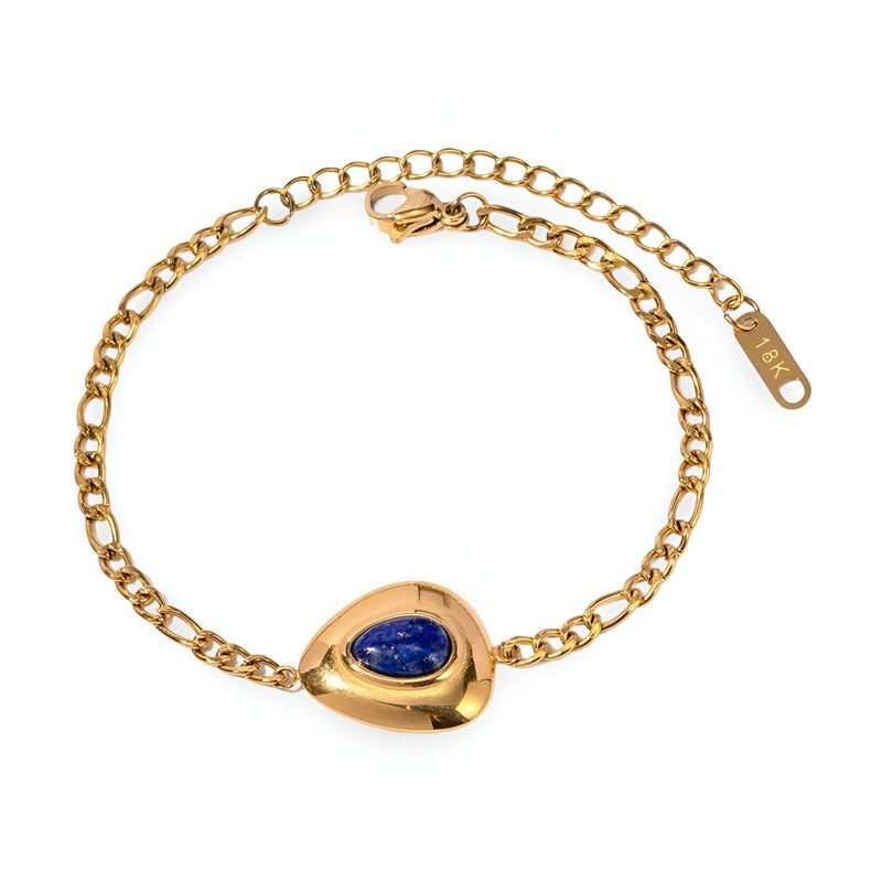 Bracelet en acier inoxydable doré avec pierre de lapis lazuli ovale sertie, chaîne maillons fins.