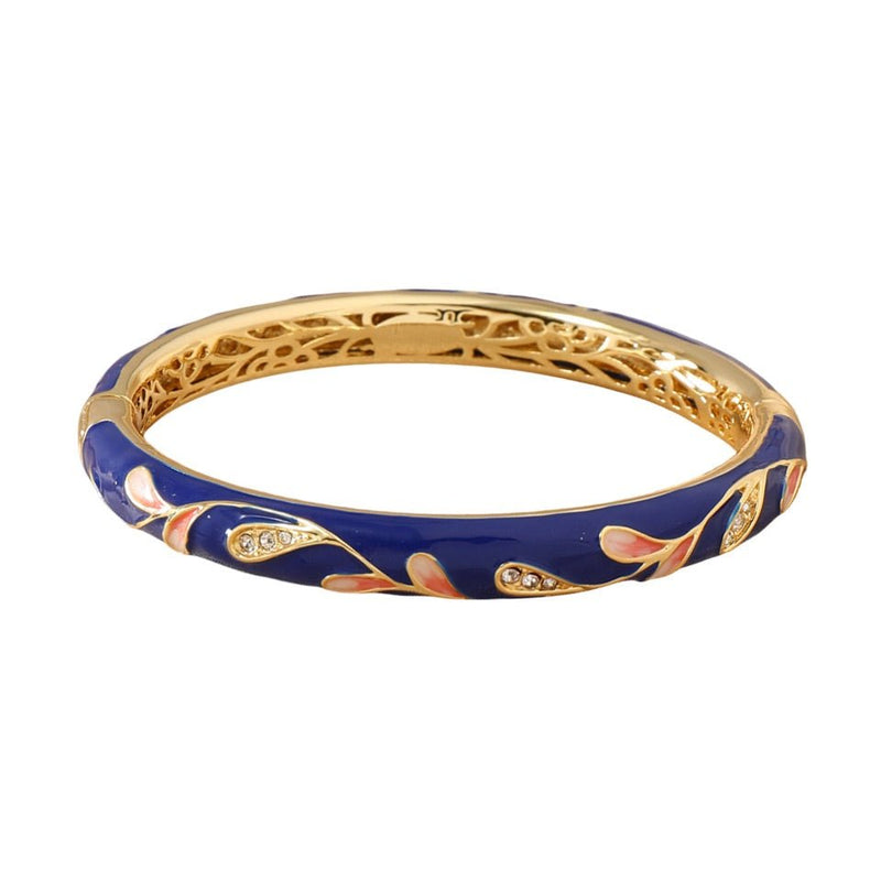 Bracelet jonc en cuivre plaqué or bleu foncé avec motif floral scintillant rose et détails dorés.