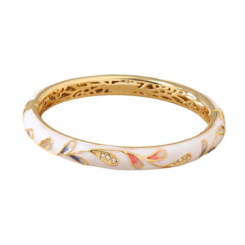 Bracelet jonc en cuivre plaqué or blanc avec motif fleuri coloré et détails scintillants.