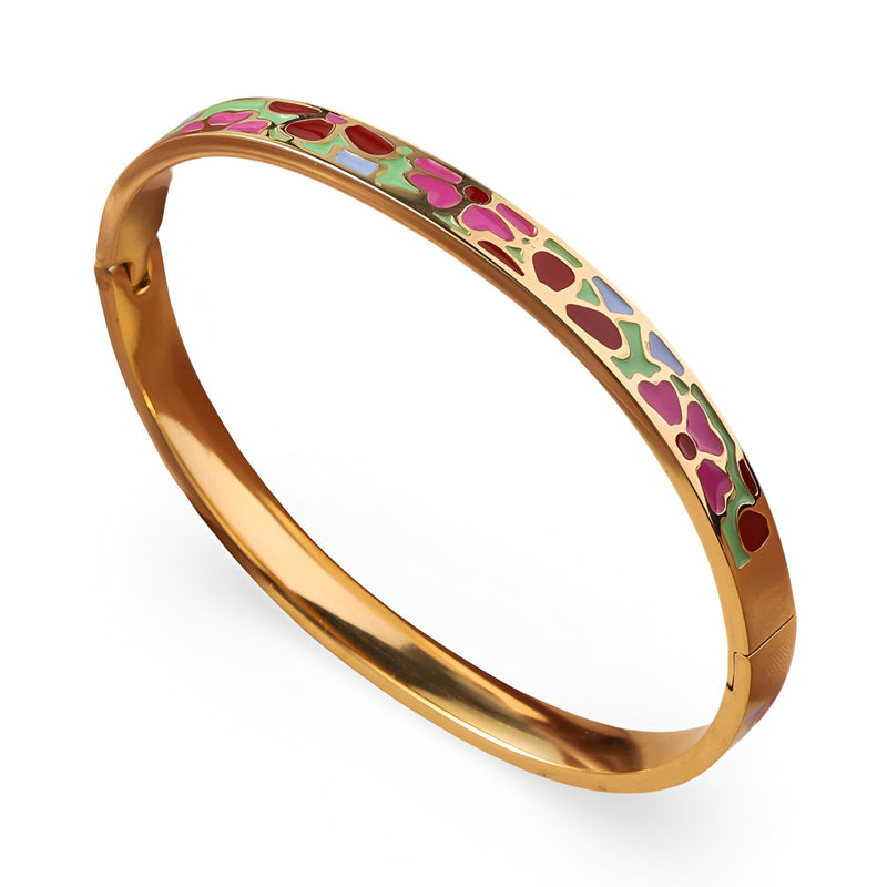Bracelet jonc doré avec émail coloré motif floral rose, rouge, vert et violet élégant.