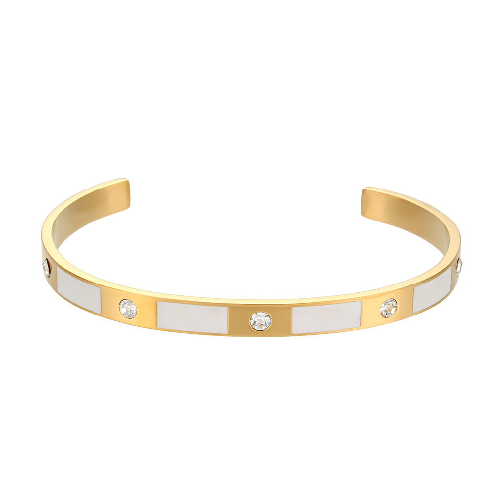 Bracelet jonc en acier inoxydable doré avec motifs géométriques blancs et pierres incrustées transparentes.