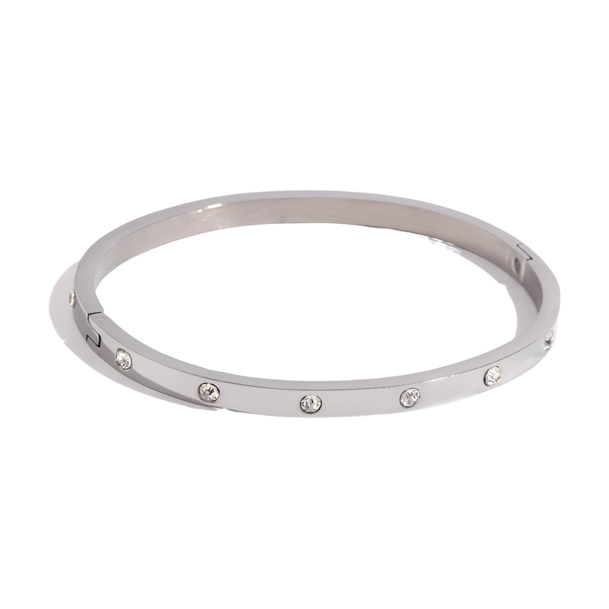 Bracelet jonc argenté en acier inoxydable orné de petits éclats scintillants evenly spaced.