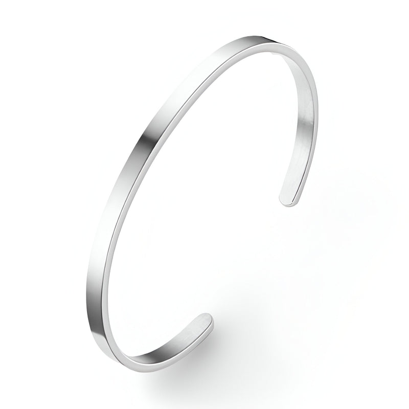Bracelet jonc en acier inoxydable argenté, design fin et minimaliste, pour homme.