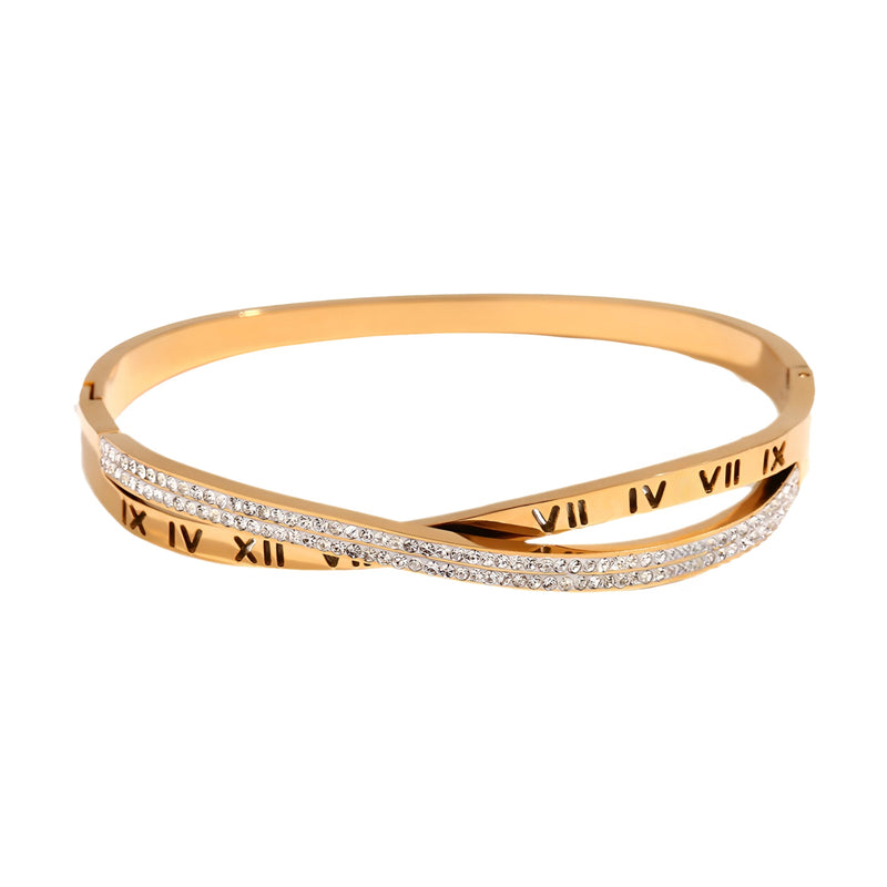 Bracelet jonc or 18 carats avec inscription chiffres romains et strass brillants en croix.