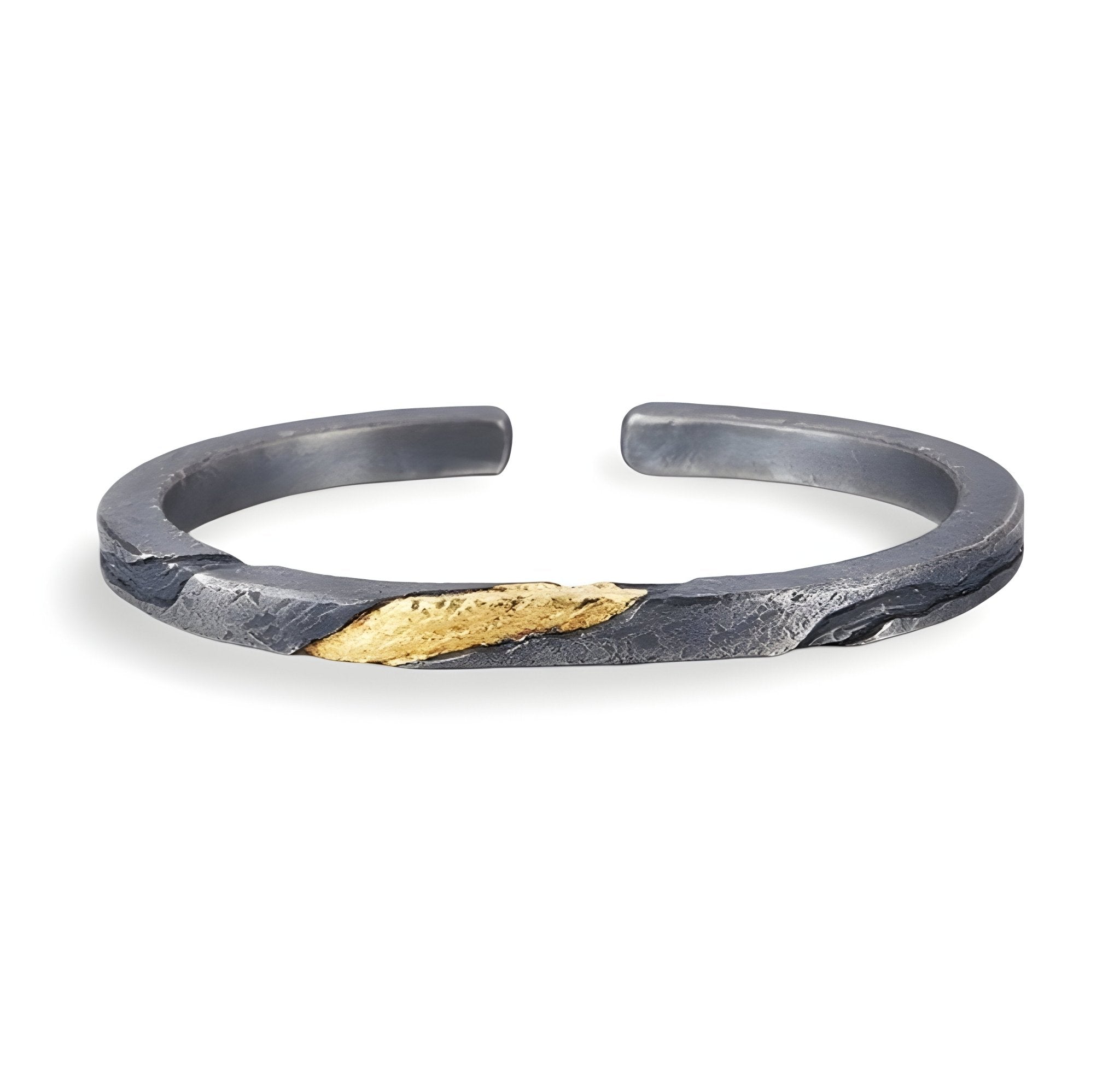 Bracelet jonc gris en cuivre avec détail doré texturé style rocheux pour homme.