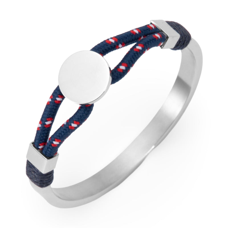 Bracelet jonc argent avec cordon bleu marine à motifs rouges et médaillon central rond lisse.