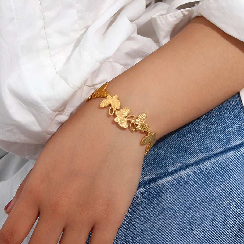 Brazalete floral tipo jonc en acero inoxidable, modelo Calliope