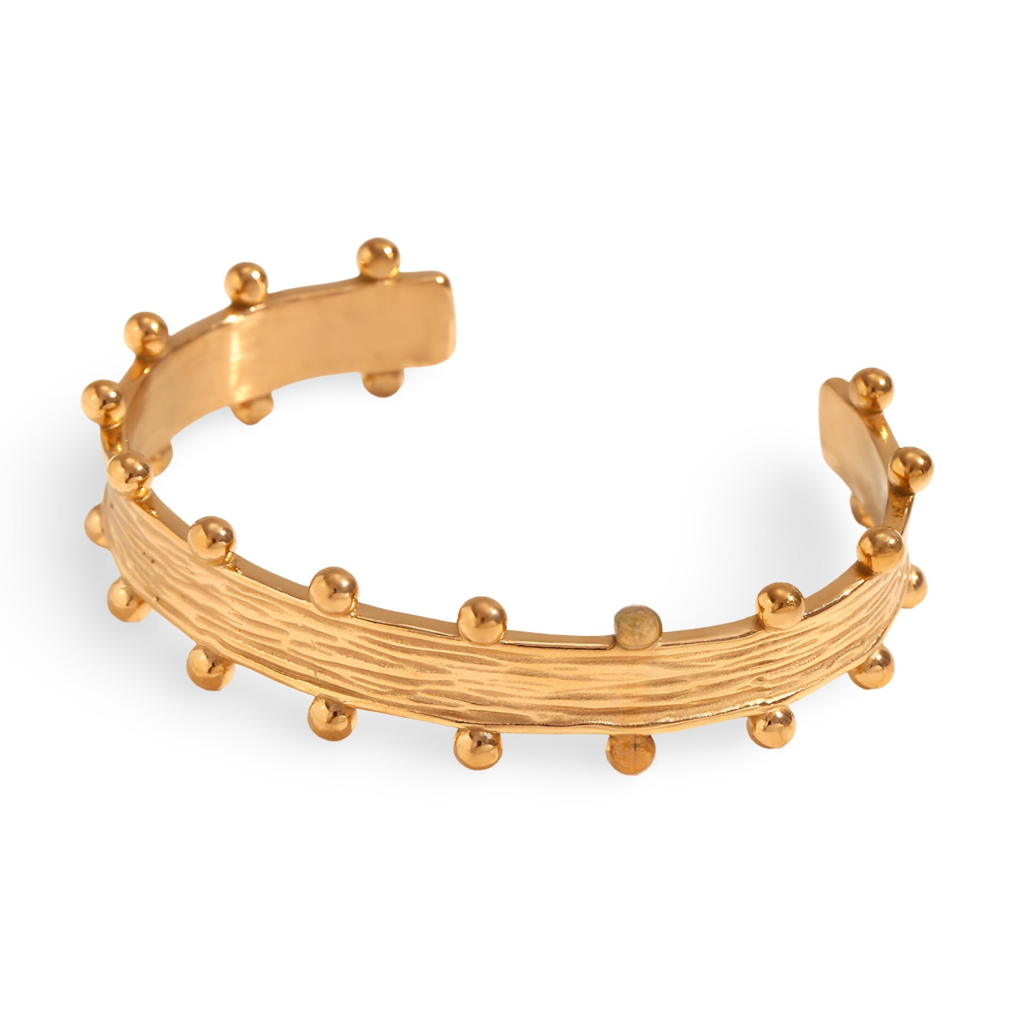 Bracelet jonc plaqué or 18 carats avec texture rayée et billes sphériques décoratives.