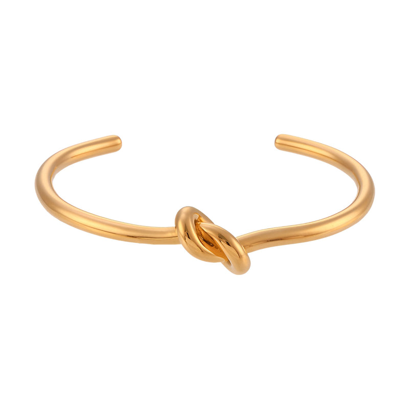 Bracelet jonc doré en acier inoxydable avec un noeud central élégant modèle Infini.