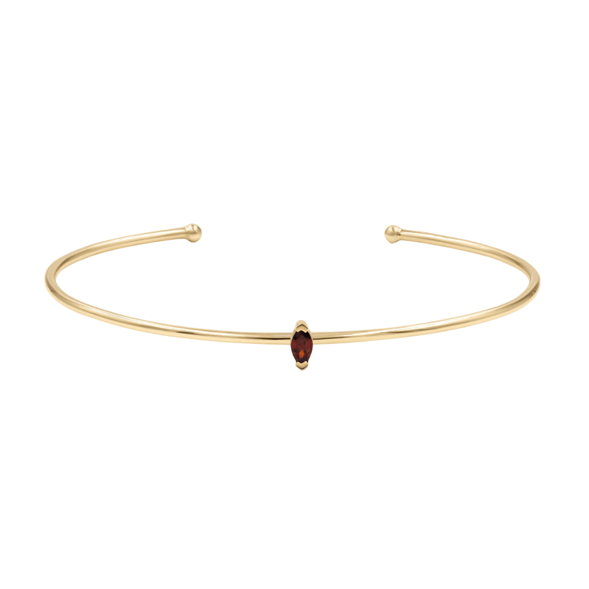 Bracelet jonc fin en acier inoxydable doré avec pierre grenat ovale centrale rouge bordeaux.